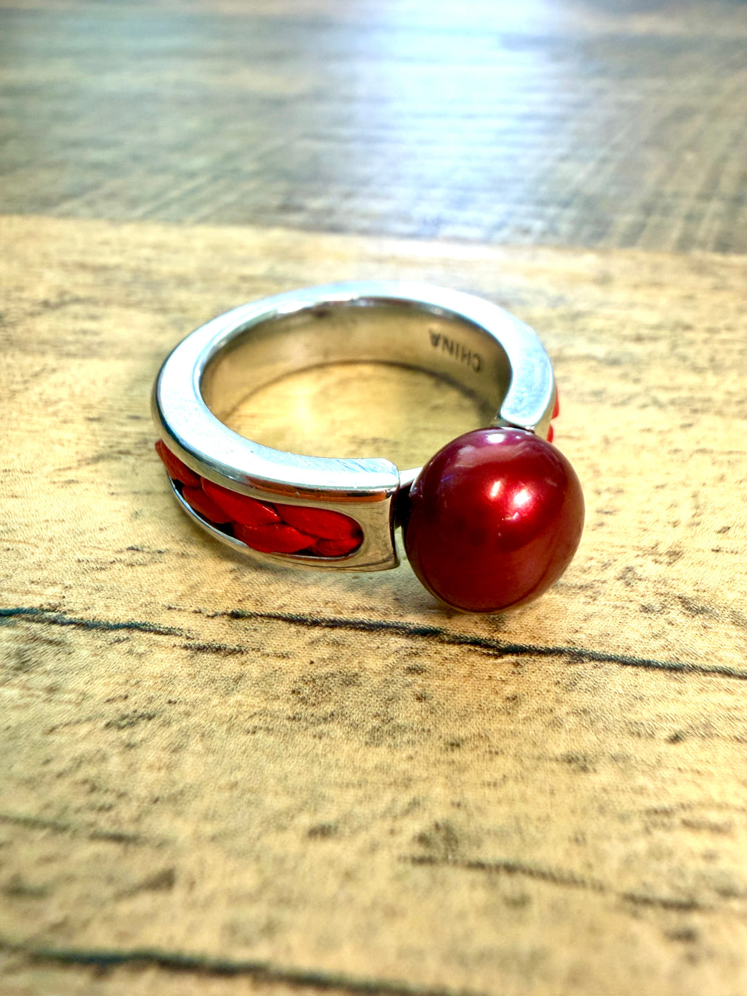 Silver Solitaire Ring with Red Pearl and Braided Inlay